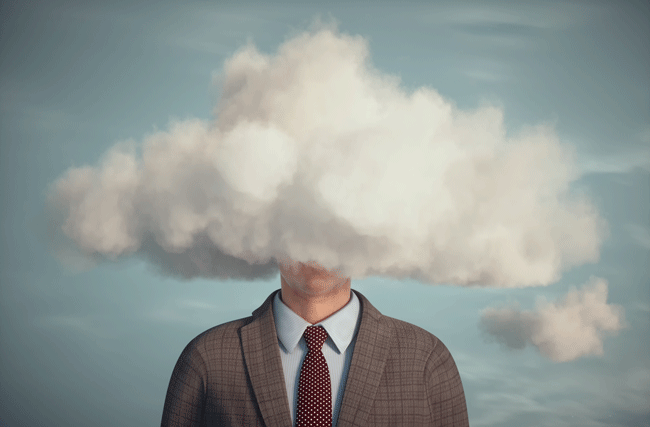 Ein Geschäftsmann mit dem Kopf in den Wolken, symbolisch für die Illusion der Stabilität in einer sich rasch verändernden Welt