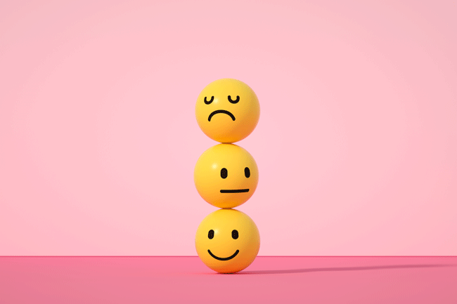 Drei Smileys mit unterschiedlichen Emotionen repräsentieren die Emotionale Intelligenz