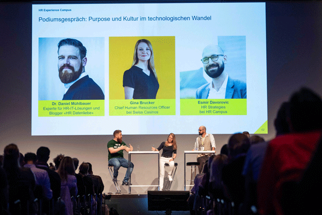 Podiumsgespräch und Panel mit den Speakern Dr. Daniel Mühlbauer von Daten Liebe, Gina Brucker von Swiss Casinos und Esmir Davorovic von HR Campus