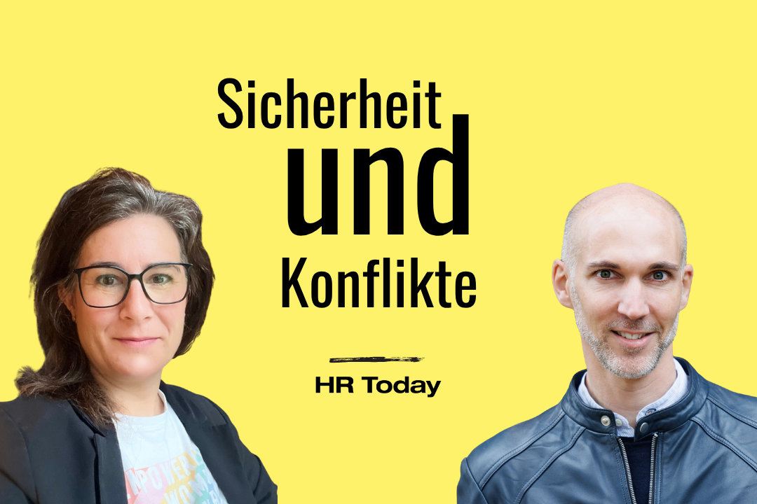 Das Bild hat einen leuchtend gelben Hintergrund. In der Mitte steht in schwarzen Buchstaben der Titel "Sicherheit und Konflikte", wobei das Wort "und" groß hervorgehoben ist. Auf der linken Bildhälfte ist das Porträt einer Frau mit dunklen, leicht melierten Haaren, einer schwarzen Brille und einem dunklen Blazer zu sehen. Auf der rechten Seite befindet sich das Porträt eines lächelnden Mannes mit Glatze, kurzem Bart und einer dunkelblauen Lederjacke. Beide Personen blicken direkt in die Kamera.