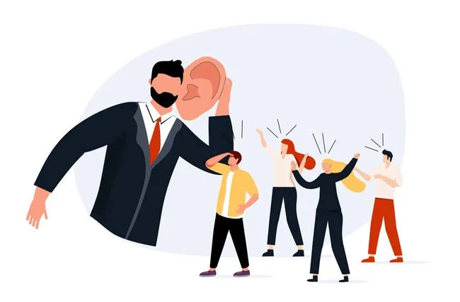 Illustration. Ein Chef mit überzeichnet grossem Ohr hört sich das Feedback seines Teams an.