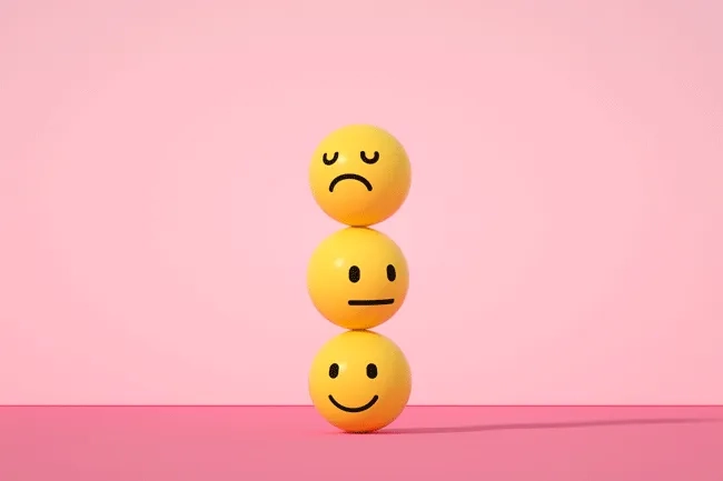 Drei Smileys mit unterschiedlichen Emotionen repräsentieren die Emotionale Intelligenz
