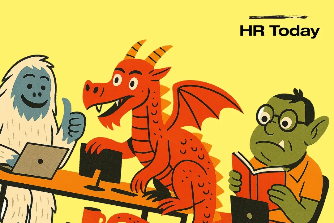 Die Kinderbuch-Illustration zeigt einen Bürotisch. Ein roter Drache klettert auf den Tisch. Links sitzt ein Yeti, der Daumenhoch zeigt, rechts in Oger mit einem Buch und Brille. 